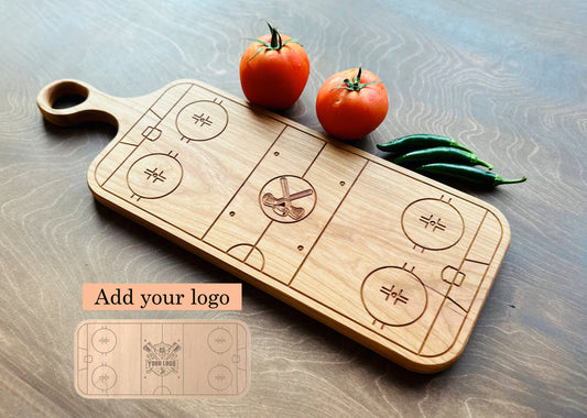 Wooden cutting board with sports court design on a wooden surface with tomatoes.