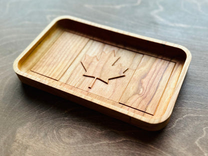 Wooden tray with a geometric design on a wooden surface